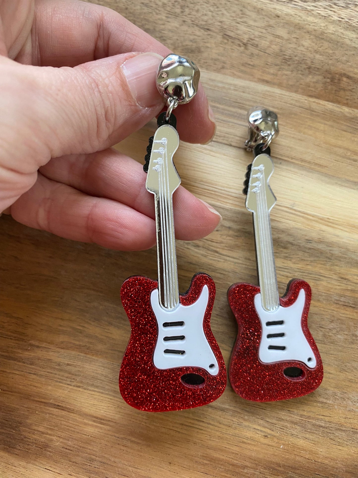 Dangling oversized glitter electric guitar clip on earrings, plastic musical instrument clip on earrings