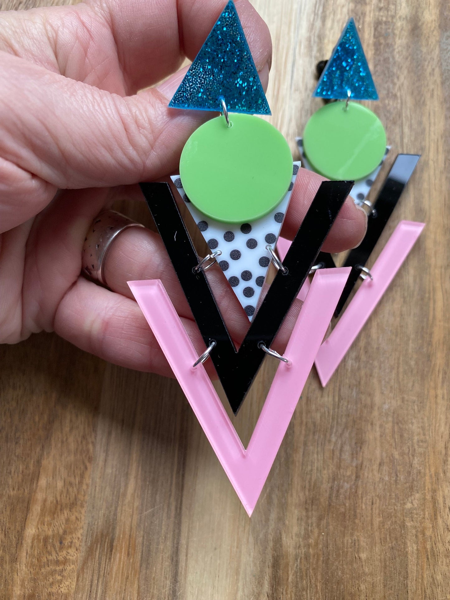 Retro plastic mega oversized clip on triangular 1980s inspired earrings, giant hinged screwback earrings