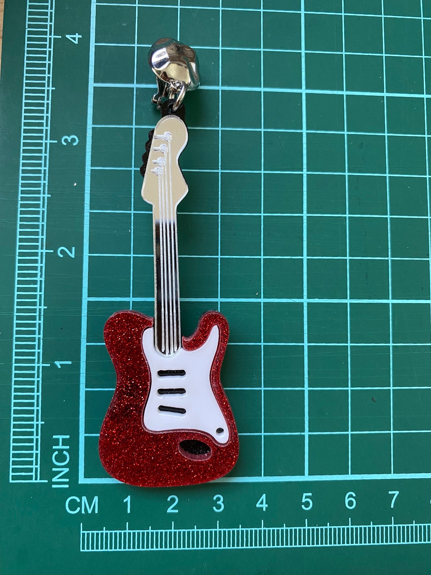 Dangling oversized glitter electric guitar clip on earrings, plastic musical instrument clip on earrings