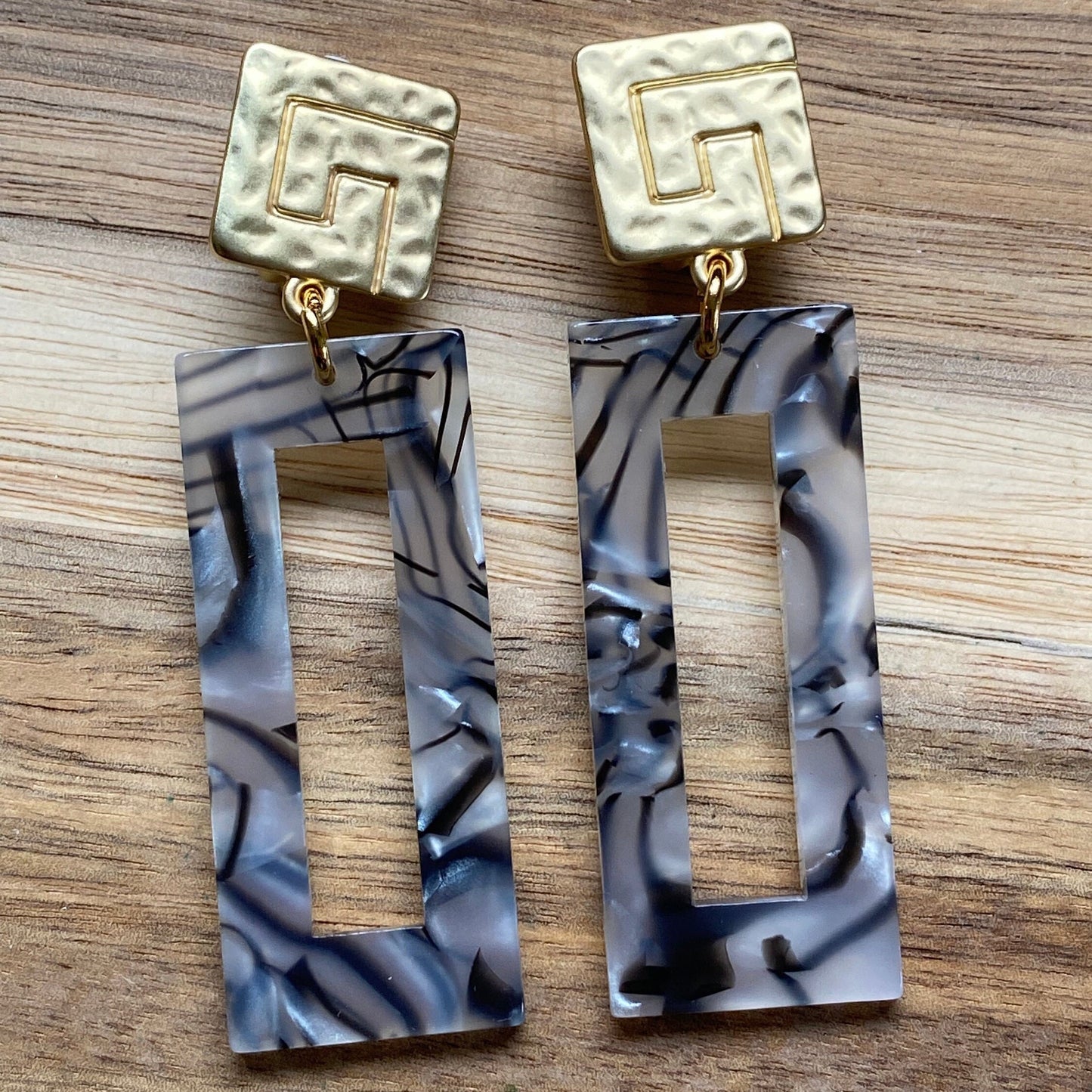 Tortoiseshell clip on black and grey earrings