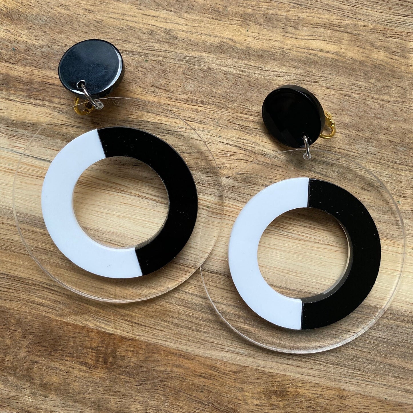 Oversized clip on black and white plastic hoop earrings