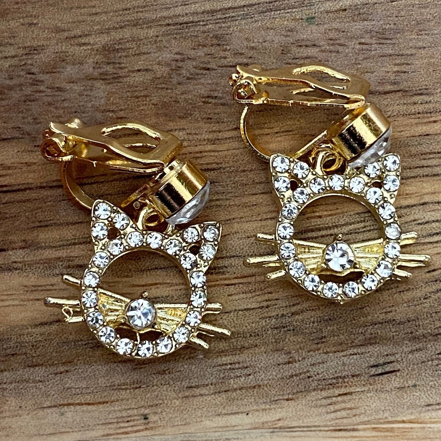 rhinestone cat clip on earrings