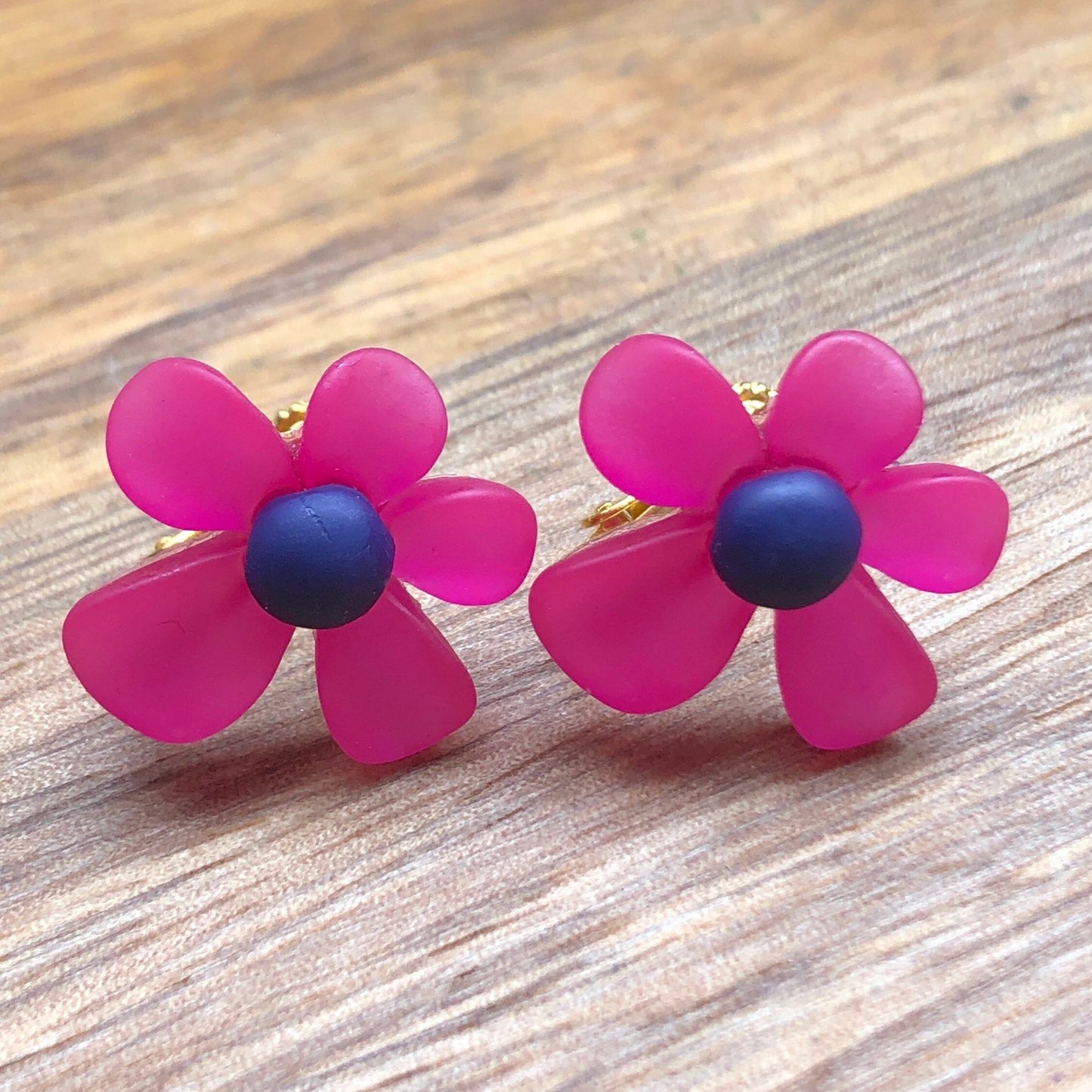 Large clip on daisy earrings,, bright coloured flowers