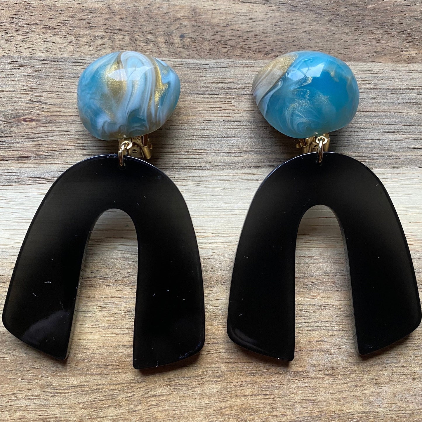 Large clip on acrylic arch earrings, modern blue and black ear clips