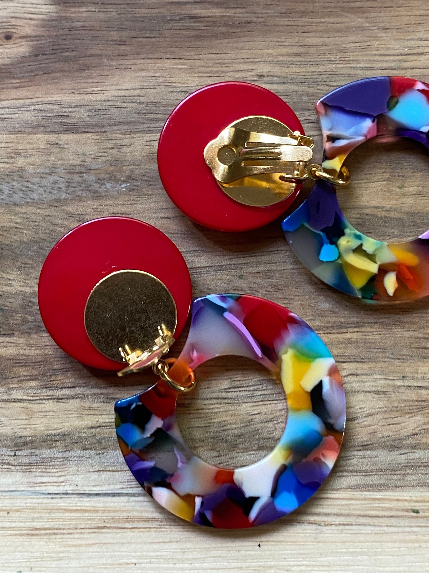 Dangling clip on rainbow tortoiseshell earrings, red and rainbow drop earrings.