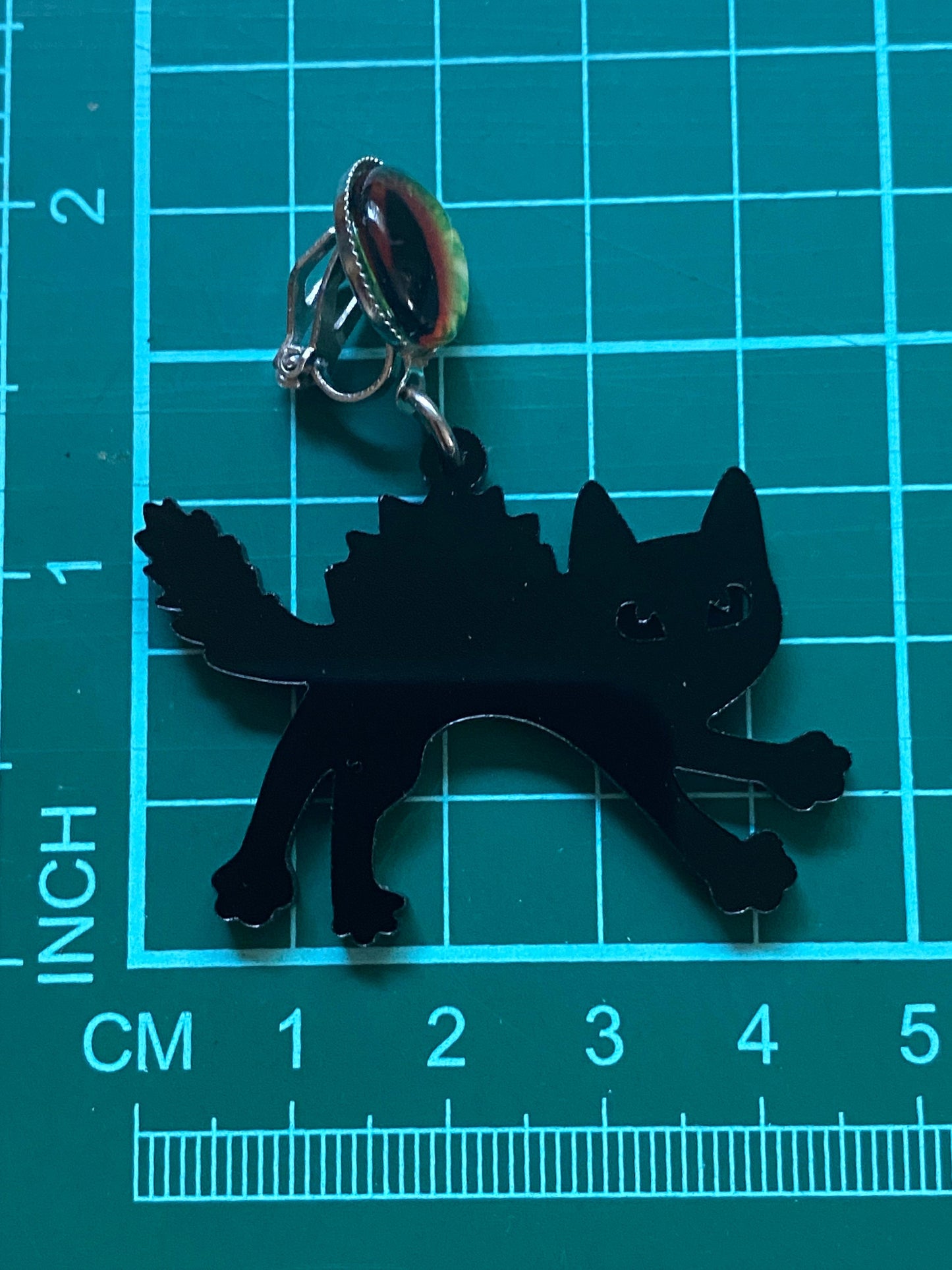 Dangling clip on cat eye black cat Halloween earrings