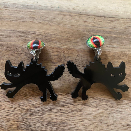 Dangling clip on cat eye black cat Halloween earrings