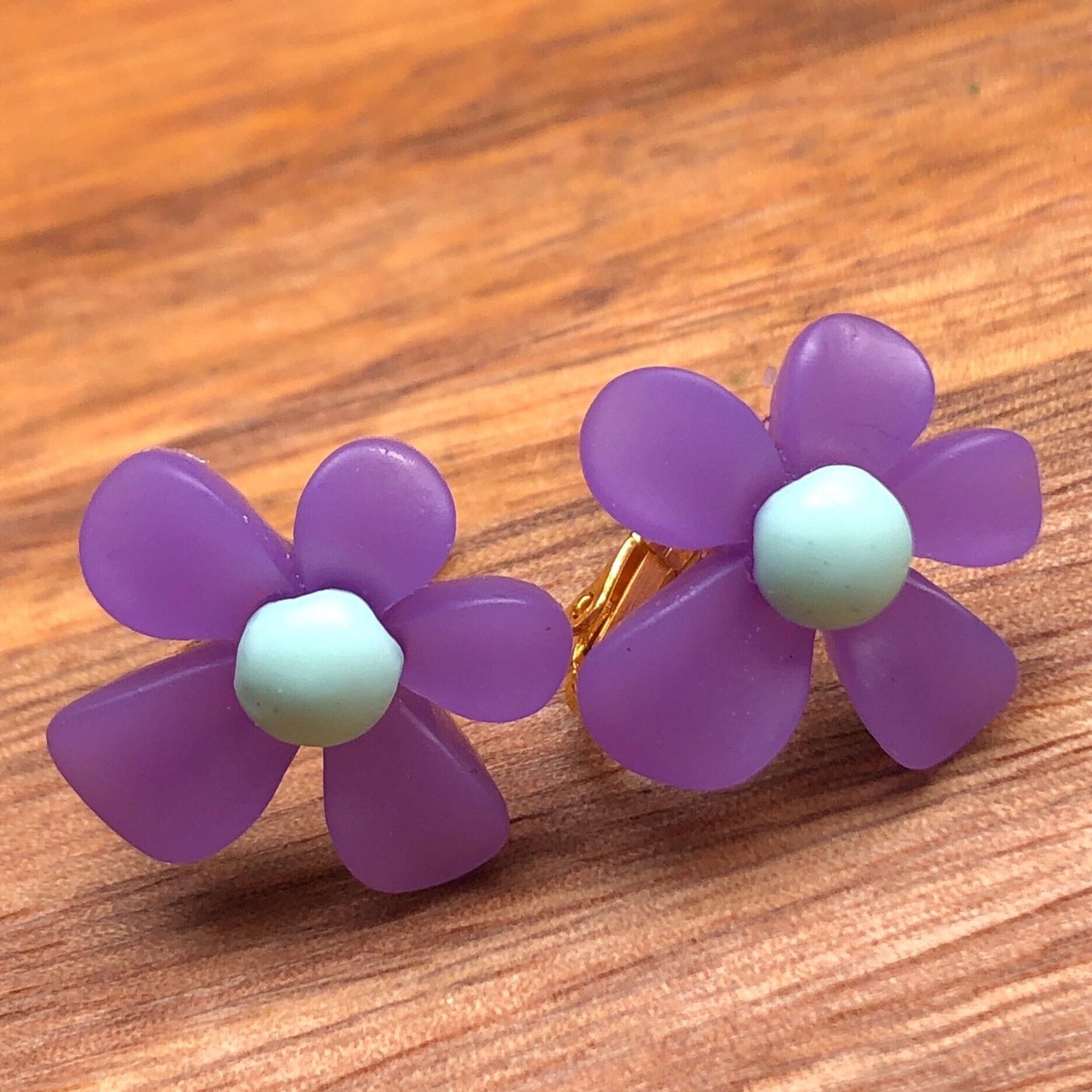 Large clip on daisy earrings,, bright coloured flowers