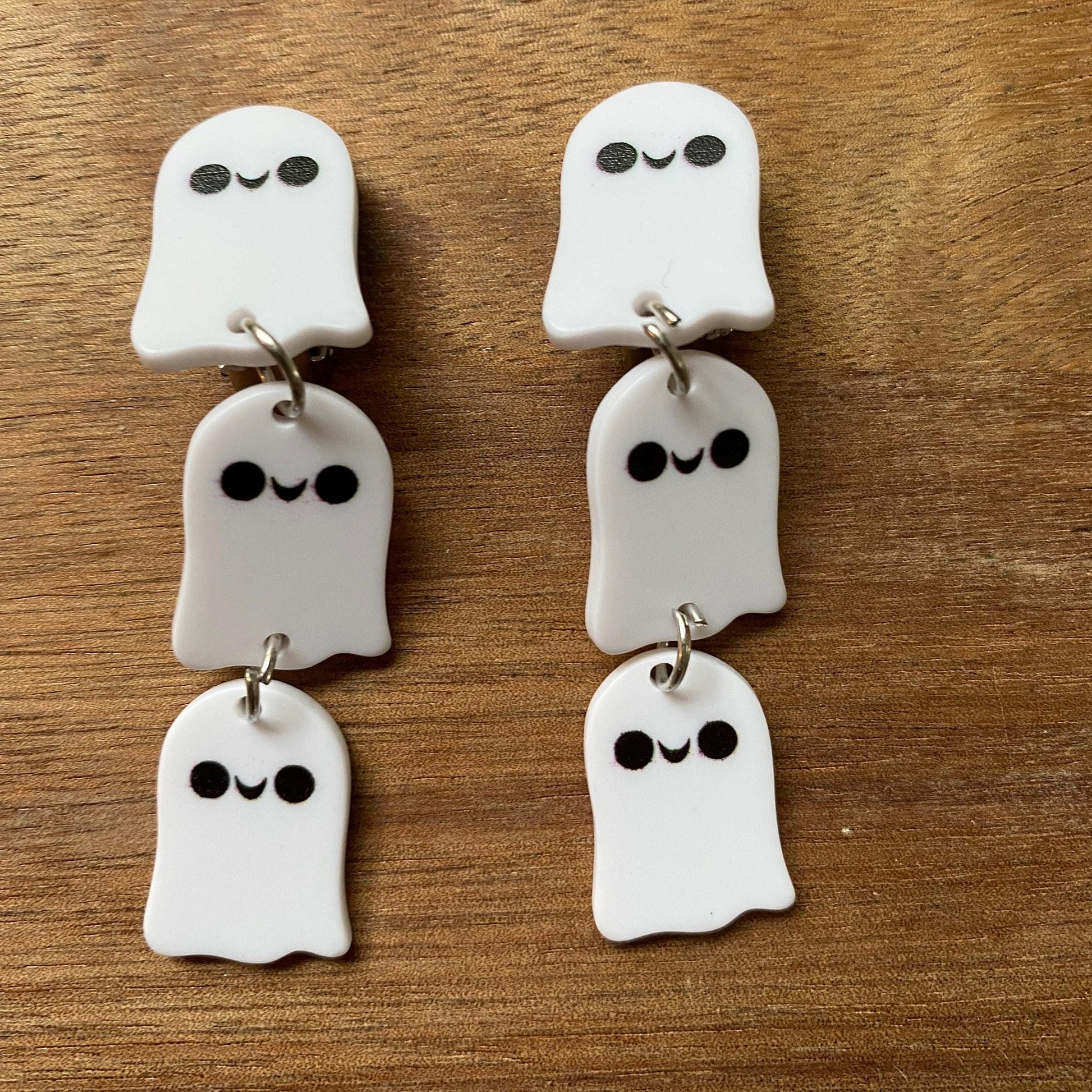 dangling ghost clip on earrings