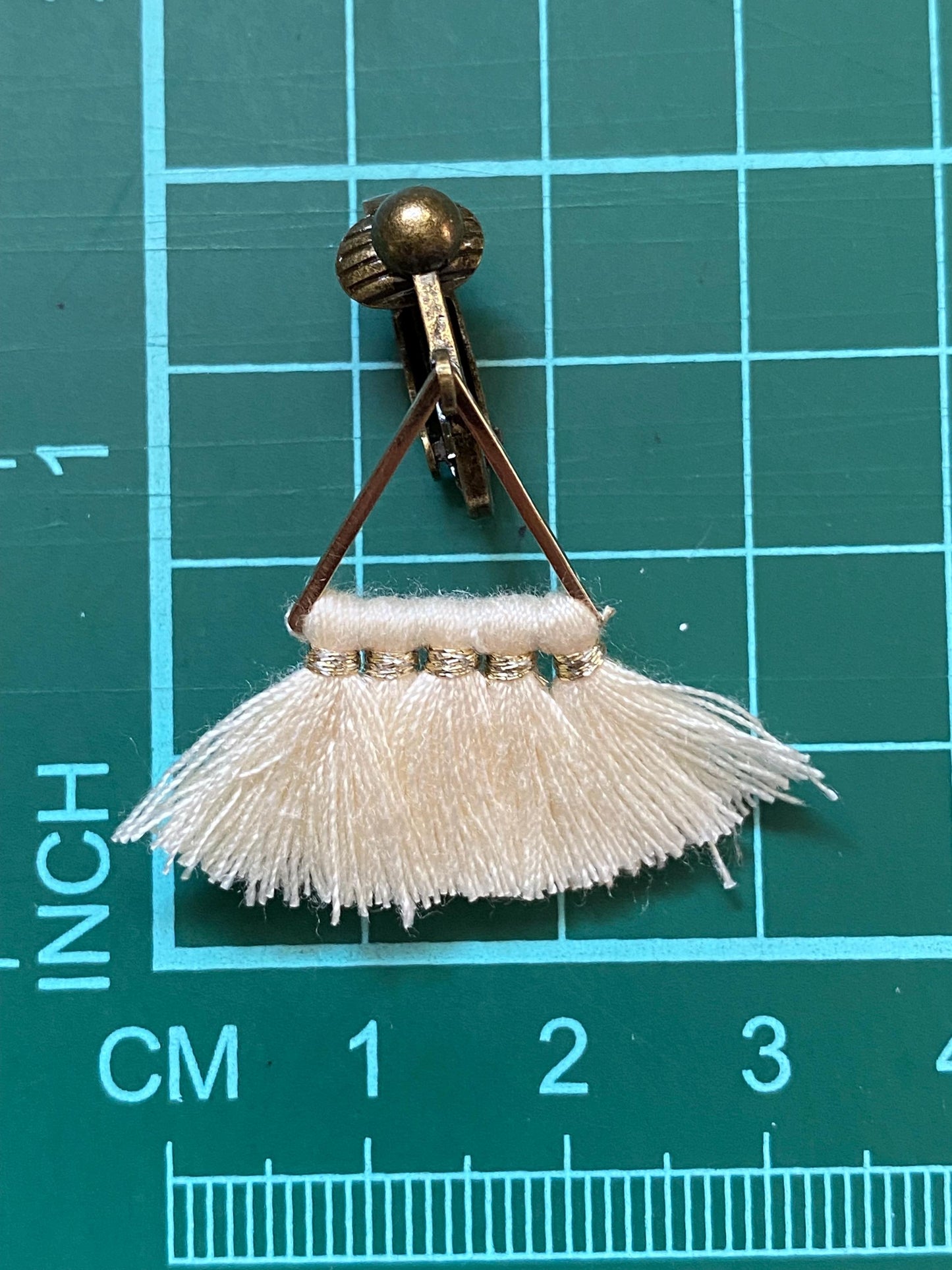 Dangling Tiny tassel clip on earrings