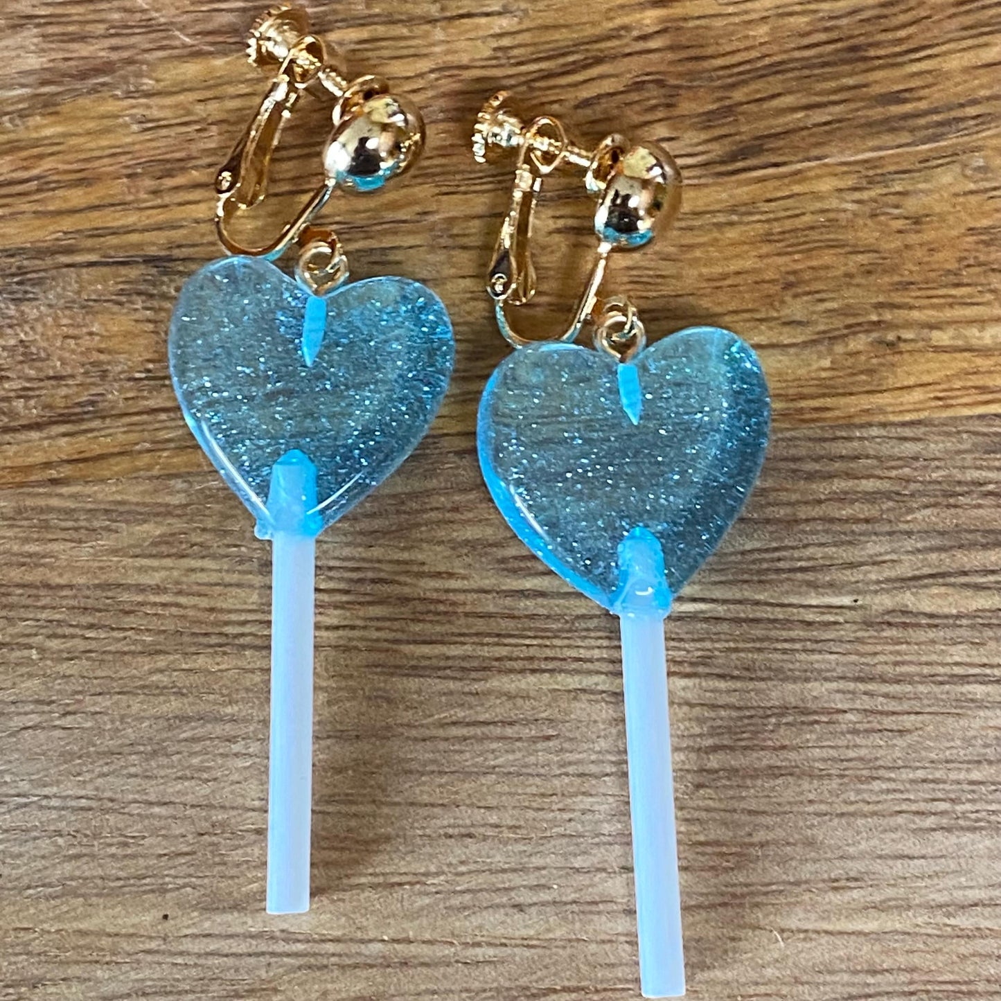 Dangling lollipop clip on earrings,  plastic heart  lollipop earrings with hinged screwback closures.