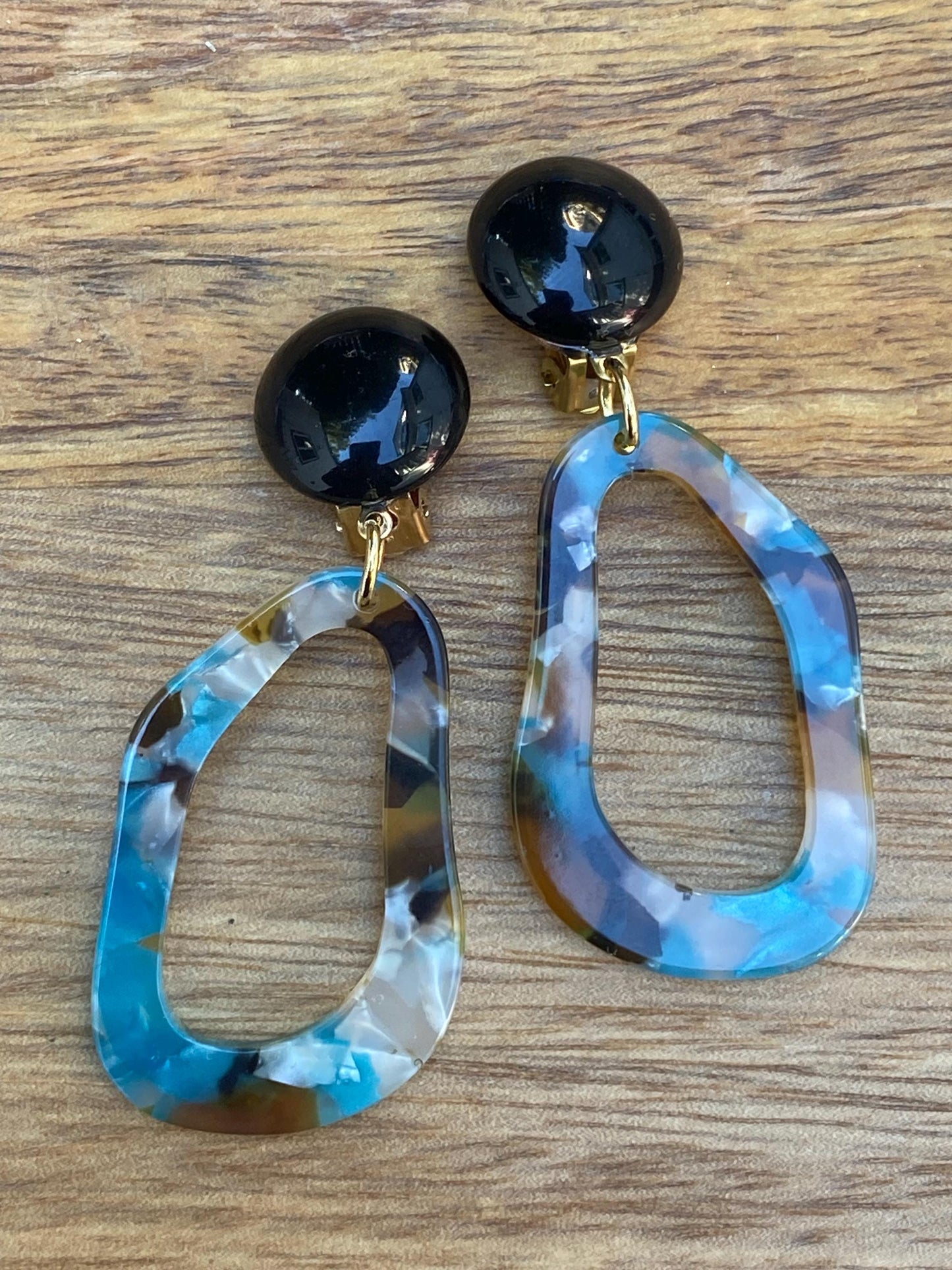 Clip on dangling blue tortoiseshell earrings