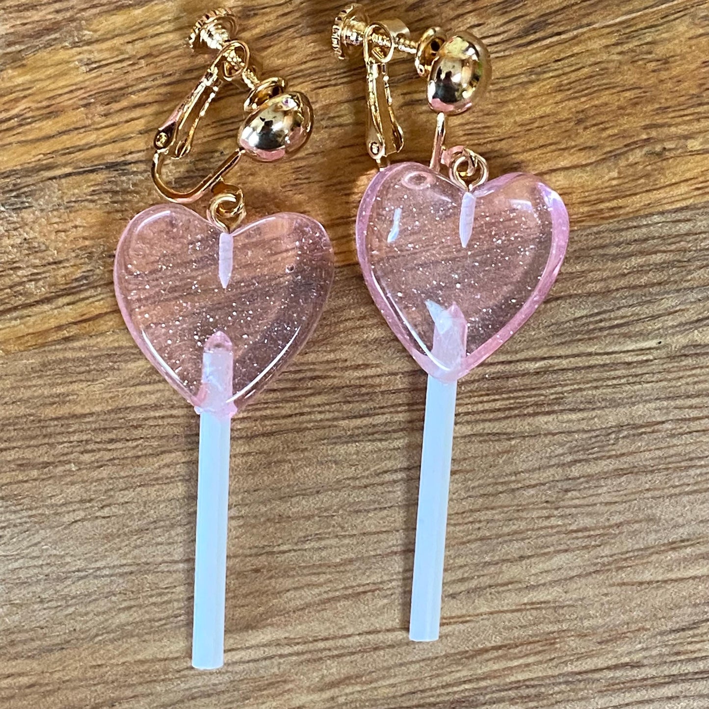 Dangling lollipop clip on earrings,  plastic heart  lollipop earrings with hinged screwback closures.