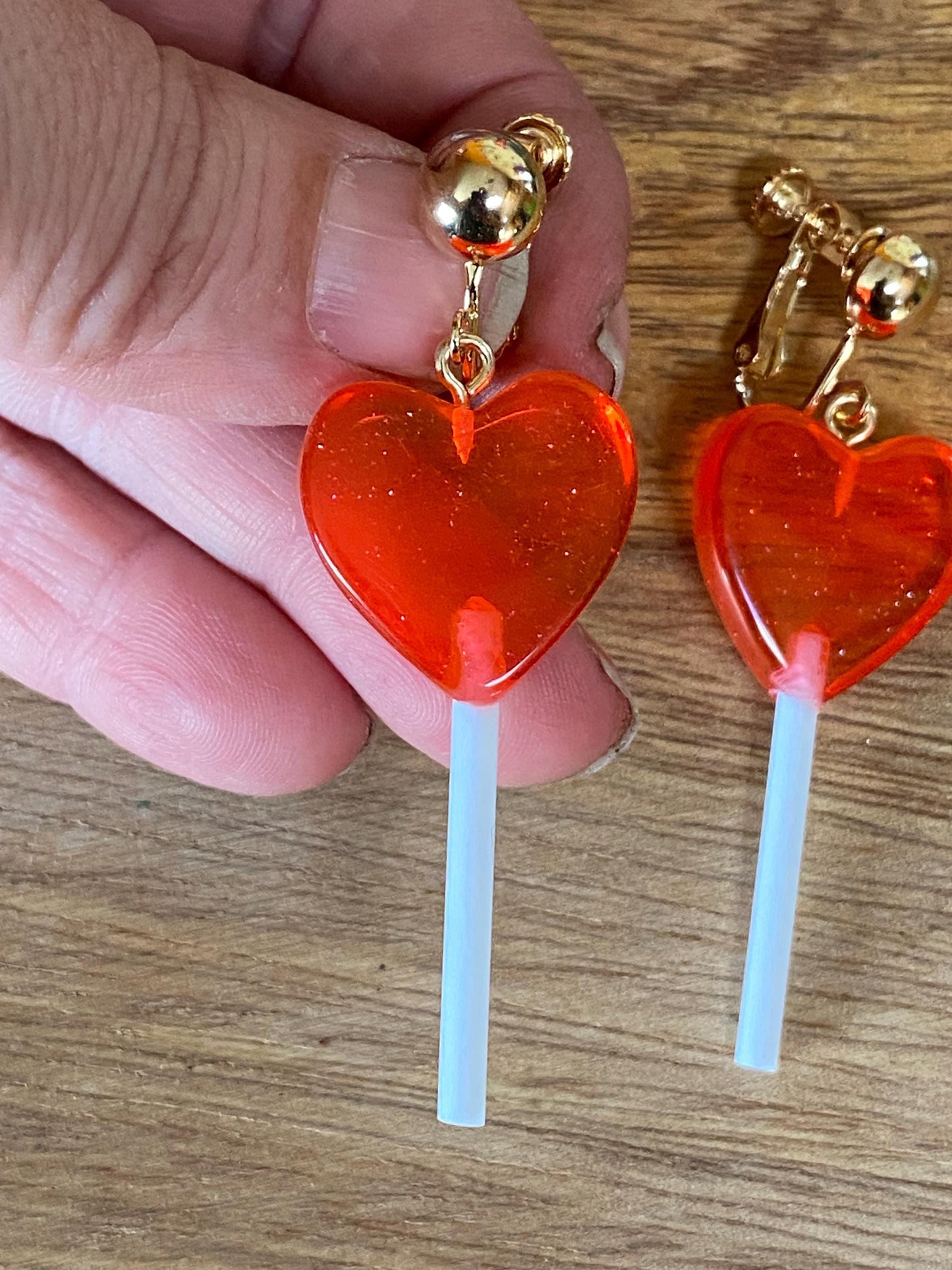 Dangling lollipop clip on earrings,  plastic heart  lollipop earrings with hinged screwback closures.