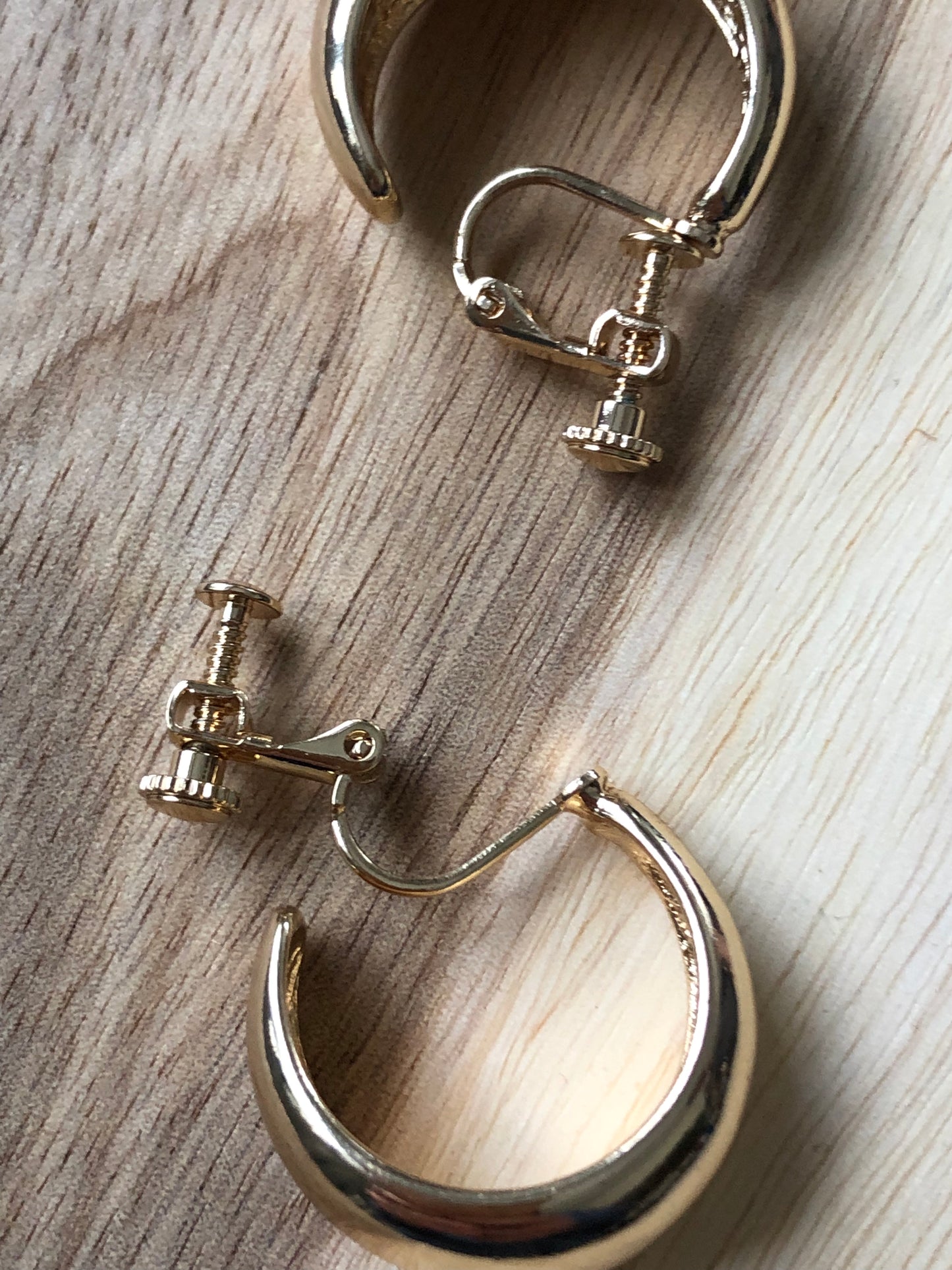 Golden clip on hoop earrings