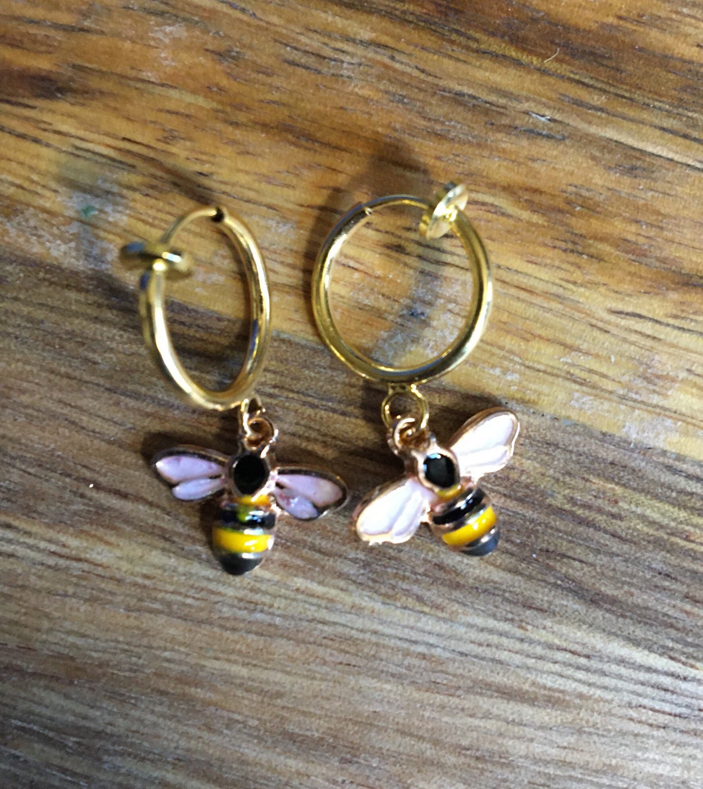 tiny clip on bumblebee earrings on false hoops