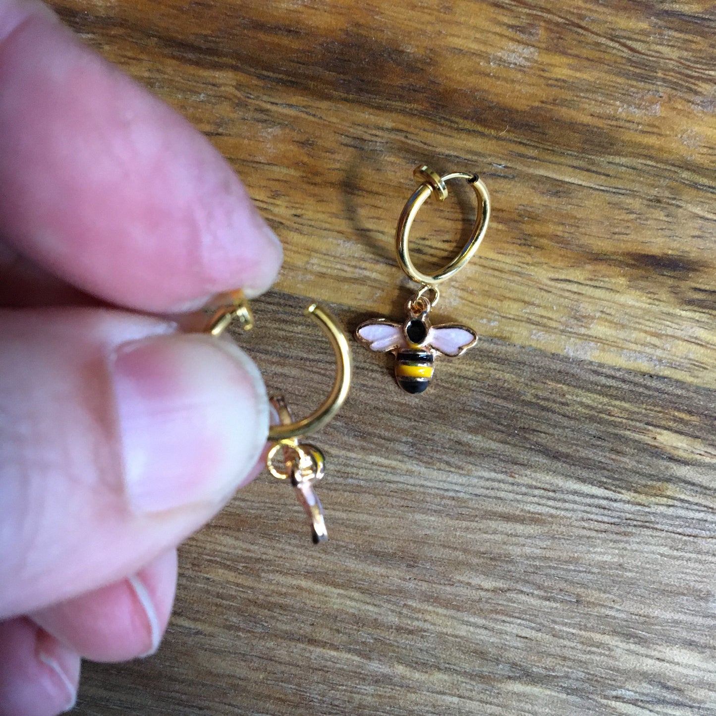 Tiny dangling bumblebee clip on spring hoop earrings