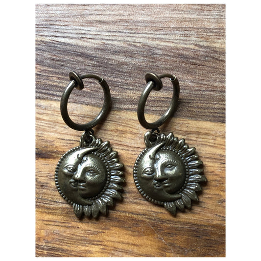 Dangling silver/bronze coloured celestial charm spring hoop clip on earrings sun and moon