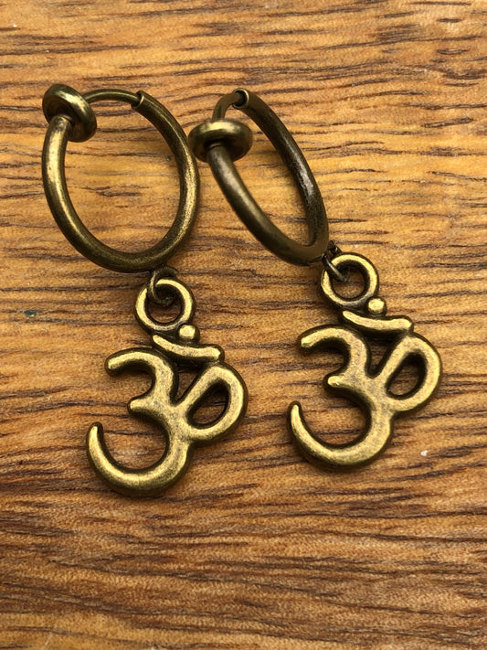 Dangling tiny bronze ohm clip on earrings (huggie| spring hoop), small earrings for unpierced ears