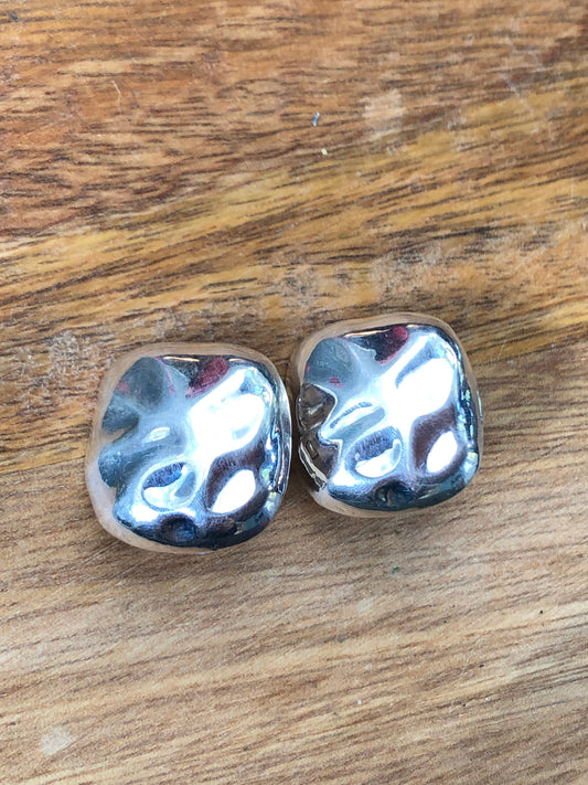 silver coloured clip on earrings