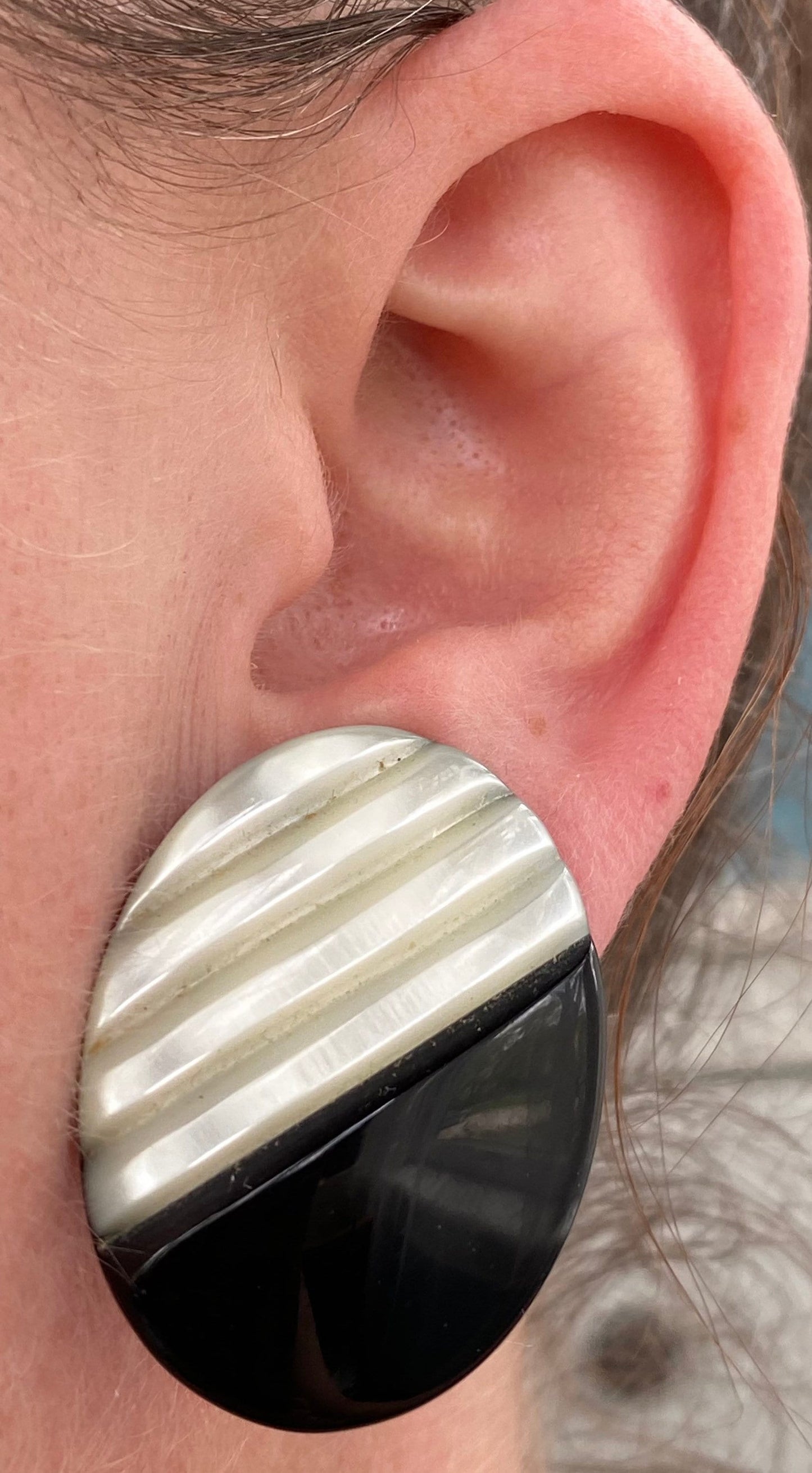 Vintage carved mother of pearl and black plastic clip on earrings