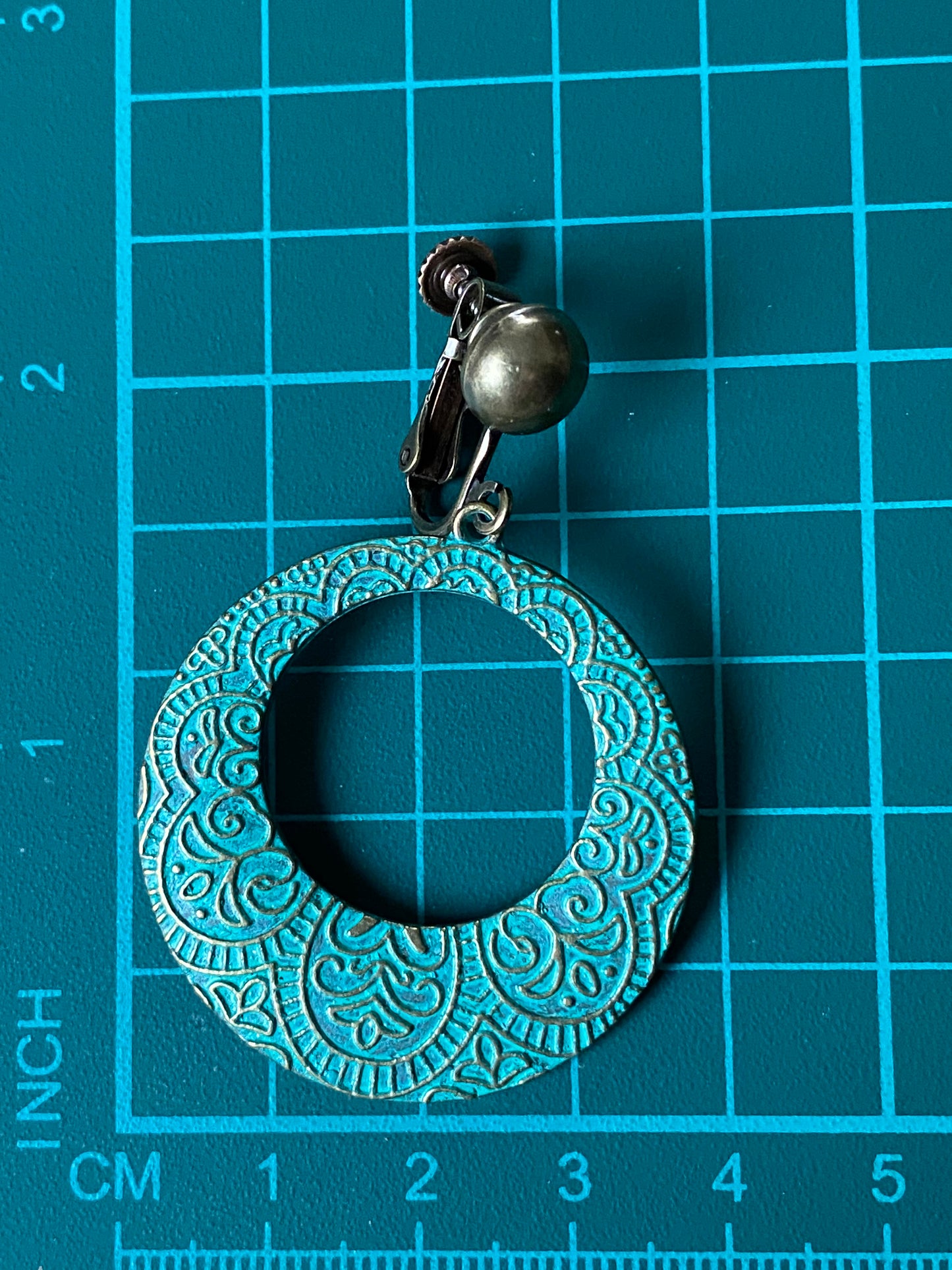 Dangling turquoise patina hoops with bronze hinged screwback closures